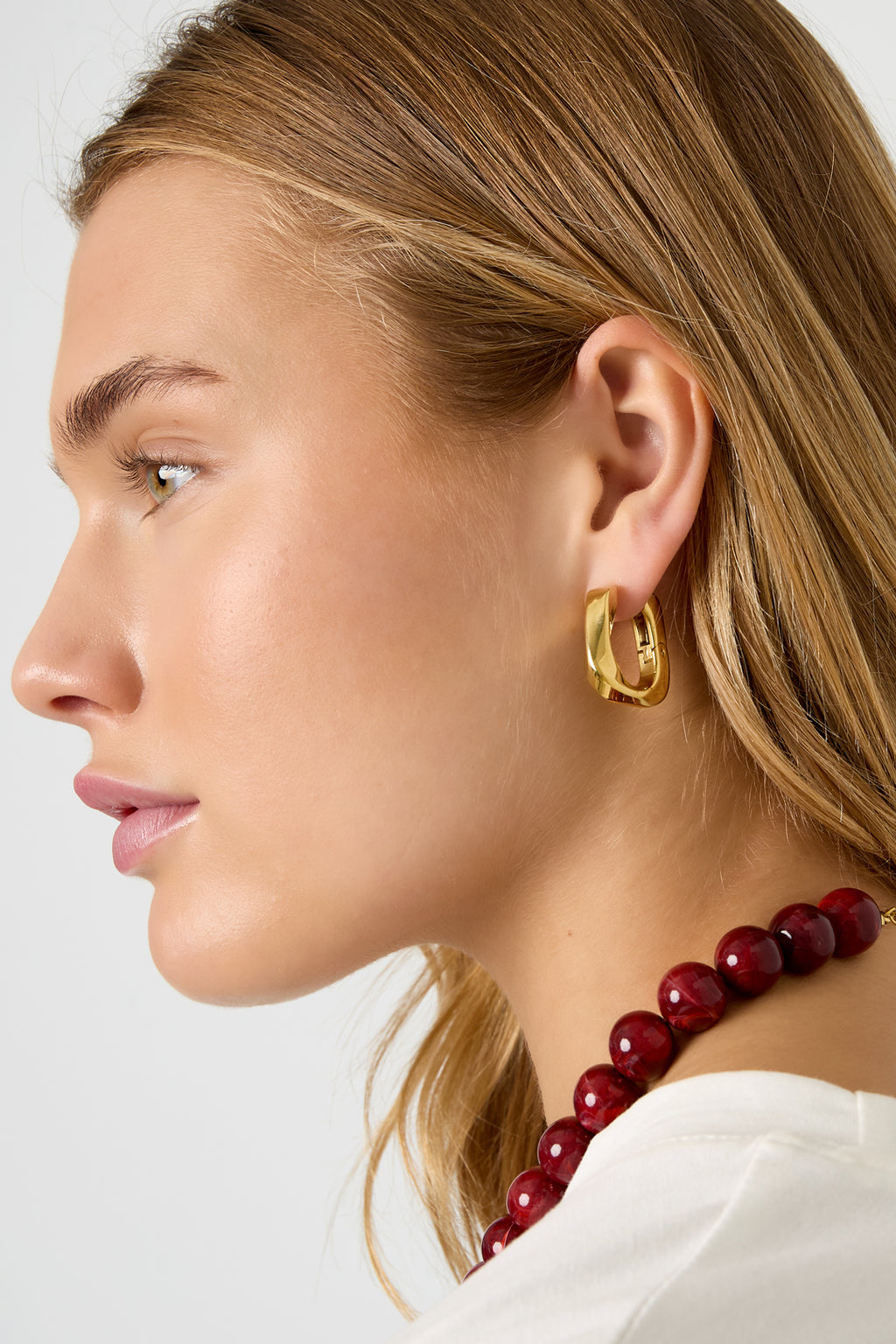 Twist Hoops rechthoekige gedraaide creolen zilveren kleur – NOLAH
